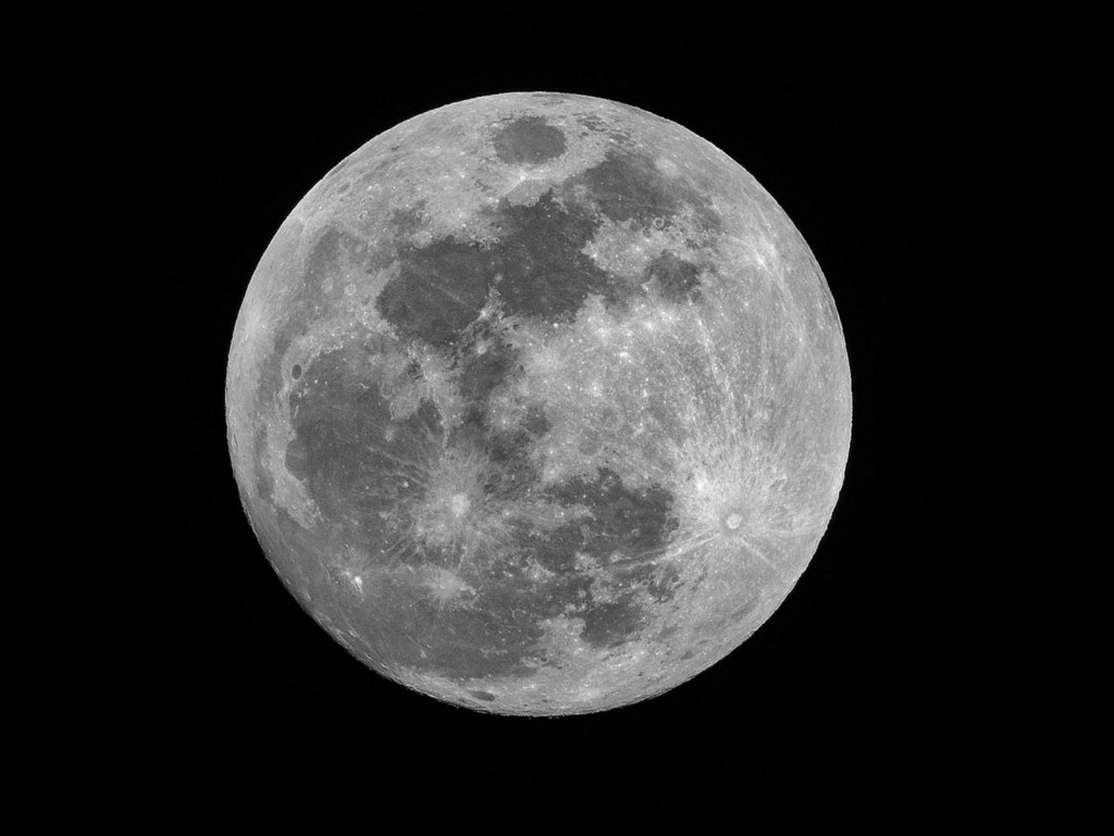 Hunter's Moon October 2026: a bright full moon in a dark night sky