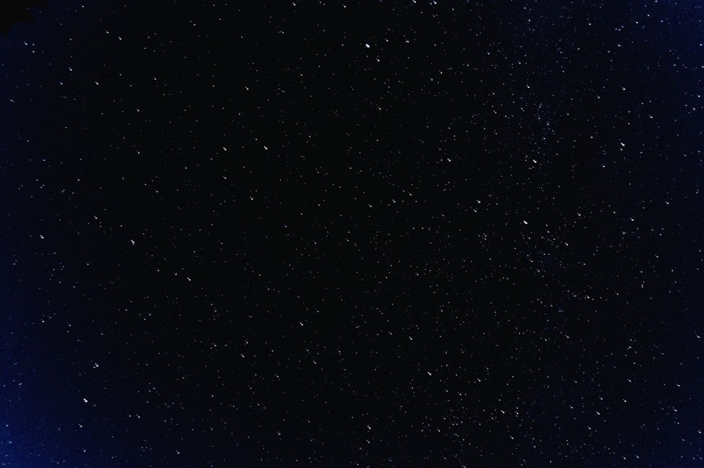 Pluto stations direct in Aquarius 2026: a dense cluster of stars in the night sky
